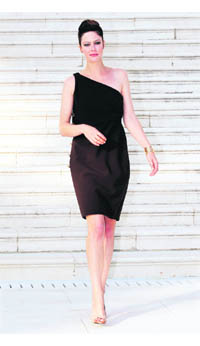 Actress Anna Mouglalis arrives for the 2011-2012 Cruise Collection show for French fashion house Chanel at the Cap d'Antibes on the French Riviera