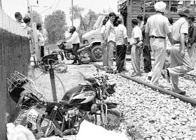The mangled remains of the bikes that were hit by a train at Dhakoli village, Zirakpur, on Thursday