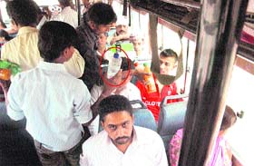 A vendor sells adulterated bottled water in a bus at Ambala Cantt