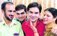 Ajaypal (red T-shirt) with his parents and brother in Ludhiana 