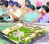 DSGMC president Paramjit Singh Saran (second from left) gives details of the gurdwara project in Delhi.