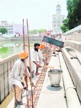 A view of the ongoing kar sewa at the sarovar of Gurdwara Kaulsar Sahib in Amritsar.