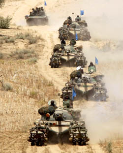 Battle tanks in action during the exercise Vijayee Bhava in Suratgarh on Friday.