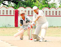 A batsman in action in the Government Employees Welfare Committee Cricket Tournament in Dehradun on Friday.