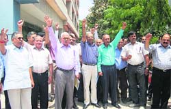 Members of the Tax Bar Association hold a protest in Dehradun