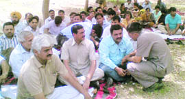 Teachers of Guru Jambheshwar University of Science and Technology stage a dharna at Hisar