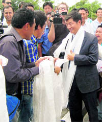 Lobsang Sangay being welcomed at Kangra airport on Friday