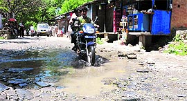 A waterlogged street in the village.