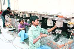 A house being lifted in Lakshmi Nagar, Rohtak
