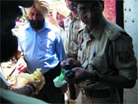 SSP Kaustubh Sharma checking the articles that were recovered from the jail premises during the surprise check.