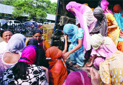 Some girls arrested for running a fake friendship club/fake massage training centre being produced at the Tis Hazare court in Delhi on Saturday