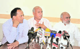 (From left) Suspended BJP MLAs Prof Gharu Ram Bhagat, Bharat Bhushan and Durga Dass address mediapersons in Jammu 