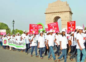 Nurses participate in a march from India Gate to Jantar Mantar to create awareness on immunisation to commemorate International Nurses Week 2011 in New Delhi on Sunday
