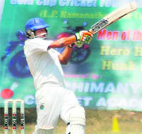 A batsman in action in the All-India Uttarakhand Gold Cup Cricket Tournament played at Rangers' College ground in Dehradun on Sunday. 