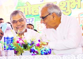 Union Minister for Road Transport and Highways CP Joshi and Chief Minister Bhupinder Singh Hooda at a rally in Gohana on Sunday