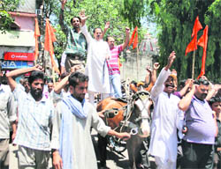 FUELLING PROTEST: Shiv Sena activists protest against the petrol price hike in Jammu on Sunday.