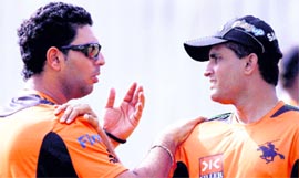 Pune Warriors Yuvraj Singh and Sourav Ganguly during a practice session in Mumbai on Sunday.