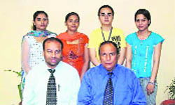 (From left) Manisha Goel, Shampy Kamboj, Dolly Sethi and Sarabhjot Kaur, students of Maharaja Agrasen Institute, Jagadhri, with Raj Kumar, director, and Adarsh Aggarwal, Head, MBA Department. 