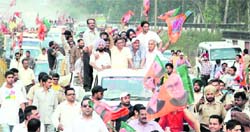 BJP leader Manoranjan Kalia with his supporters in Jalandhar