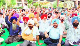 Engineers raise slogans against the police and government in Amritsar on Tuesda