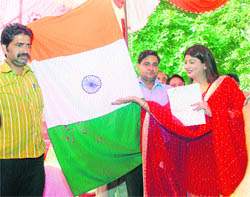 again in action: Fiza alias Anuradha Bali addresses a press conference at her residence in Mohali on Tuesday. 