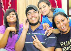 All smiles: ISC Class XII commerce topper Rana Gurtej Singh with his sisters in Kharar on Tuesday.