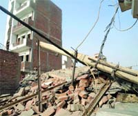 The site of the collapse at Nihal Vihara of west Delhi.