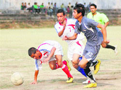 A match in the Presidents Cup football tournament played in Dehradun on Tuesday. 