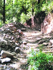 The path for pedestrians after the intiation of construction work in Mussoorie.