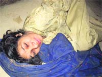 A file photo of Radha in chains in a dingy room in her brothers house at Jakhal in Fatehabad.