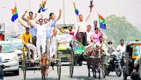 Bharatiya Chaitanya Party workers protest against the petrol price hike in Jammu on Tuesday.