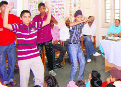 Hearing impaired children perform during a cultural event in Patiala 