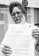 Capt Joginder Singh (retd) shows the documents of his correspondence with the Mohali Police. He has been running from pillar to post to get a theft case registered.