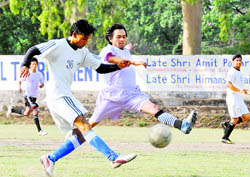A match in the Presidents Cup football tournament played at the Pavilion Ground in Dehradun on Wednesday