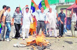 Activists of the Bharatiya Chaitanya Party stage a protest in Jammu