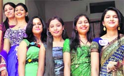 Students pose during a farewell party at the Master Tara Singh College for Women in Ludhiana