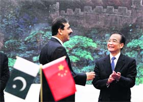 ALL-WEATHER FRIENDS: Pakistan's Prime Minister Yusuf Raza Gilani with Chinese counterpart Wen Jiabao in Beijing on Tuesday