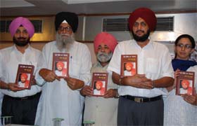 Jasdev Singh Jassowal releases a book written by Harinder Singh Chahal (retd IPS) 'Mere Hisse Da Punjab" during a function in Bathinda on Thursday.