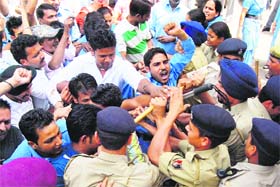 MELEE: Policemen try to control members of the Ekta Contract Workers Union at a protest near the medical superintendents office in GMSH-16, Chandigarh, on Thursday