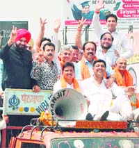 Industry Minister Tikshan Sud and Navjot Sidhu in Amritsar.