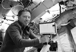 European Space Agency astronaut Roberto Vittori of Italy unpacks the laser range finder on the mid deck of the space shuttle Endeavour in this photo provided by NASA
