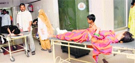 Left Alone No attendant to help patients outside an emergency ward at Government Multi-Speciality Hospital (GMSH), Sector 16, Chandigarh, on Friday.