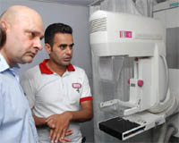 Kulwant Dhaliwal (left) at the mobile cancer detection unit that held a camp at Chauke village in Bathinda on Saturday. 