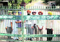 Seven employees of the sugar mill, who were confined by security personnel, at Jagraon on Saturday