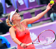 Denmarks Caroline Wozniacki serves against Francesca Schiavone during the Brussels Open semifinal on Friday.