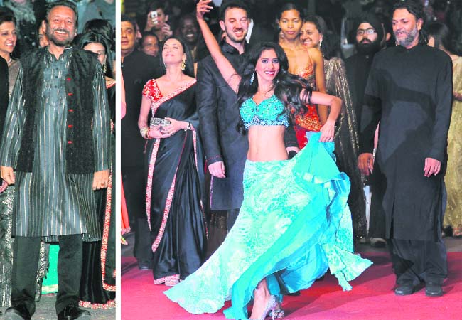 B-TOWNs DAY OUT: Shekhar Kapur (L) poses on the red carpet; director Jeff Zimbalist (behind dancer) and co-director Rakeysh Omprakash Mehra (right) before the screening of Bollywood  The Greatest Love Story Ever Told, presented out of competition at this years Cannes Film Festival