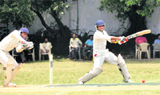 A batsman in action during the Uttarakhand Gold Cup Cricket Tournament in Dehradun on Sunday