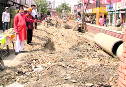 Newly carpeted main road in New Shivpuri that has been dug up to divert sewerage in Ludhiana