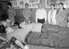 For a noble cause Volunteers donate blood during a blood donation camp at DAV Public School in Patiala on Monday
