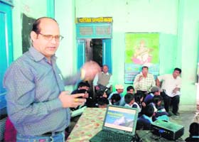Dr DP Uniyal ,senior scientist, Uttarakhand Council of Science and Technology, delivers a lecture on biodiversity at Government Inter-College, Satiyo, Tehri Garhwal district, on Monday